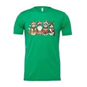 Unisex Christmas T Shirt Featuring Four Festive Cats In Santa Hats And Cozy Sweaters
