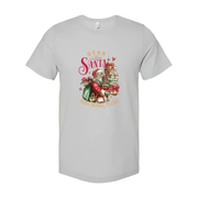 Unisex Christmas T Shirt with Santa Carrying a Stack of Books and Gifts Graphic Design
