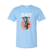 Unisex BMX Bike Graphic T Shirt With Dynamic Rider And Peach Circle Backdrop Illustration