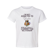 I'm Not Addicted to Books We're in a Committed Relationship Graphic Tee Featuring a Dog Reading Books