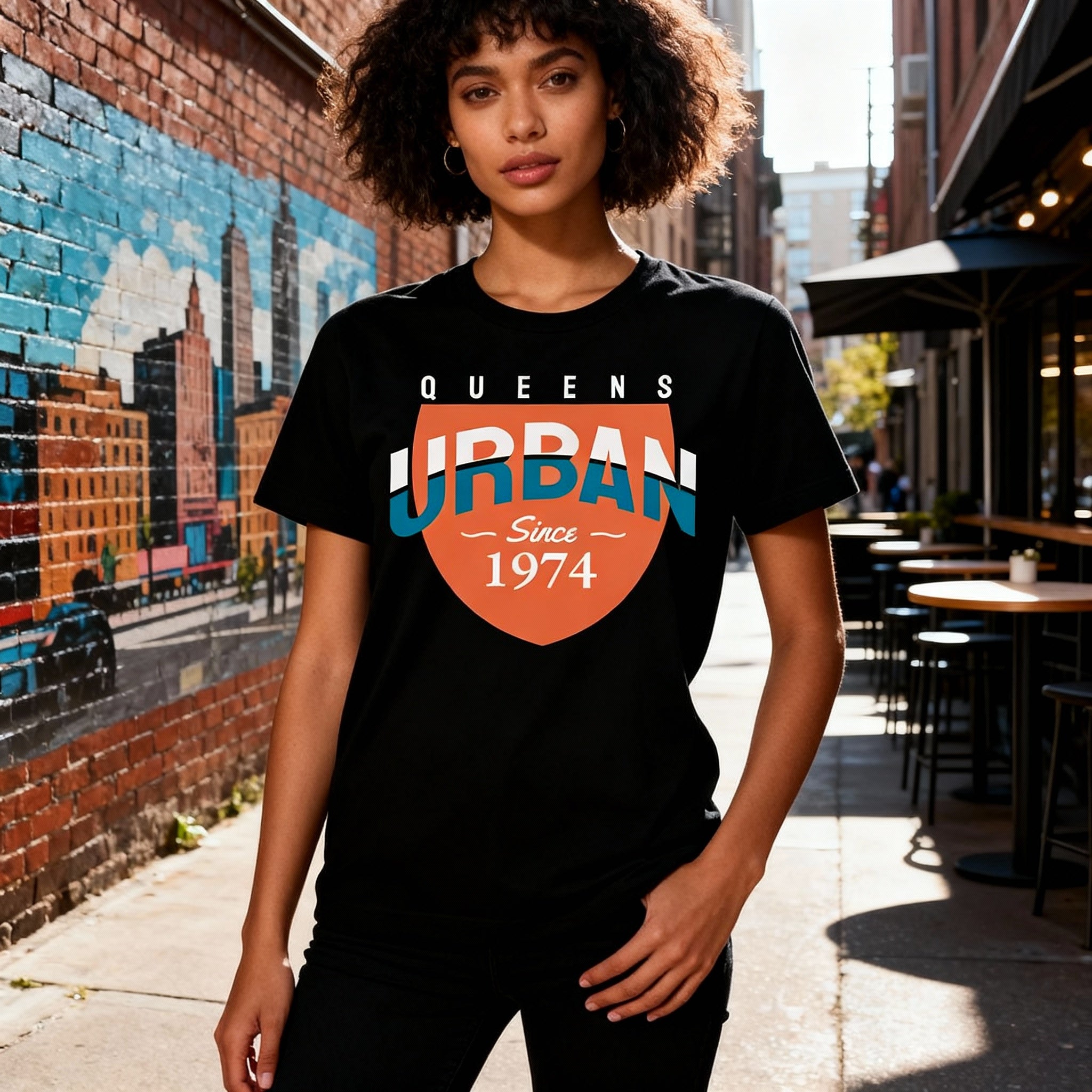 Queens Urban Shield Graphic Tee Unisex Short Sleeve With Orange Shield And Blue Accent Since 1974